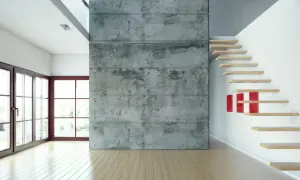 Nowoczesne wnętrze z betonem zbrojonym włóknem szklanym, drewnianymi schodami i dużymi oknami.