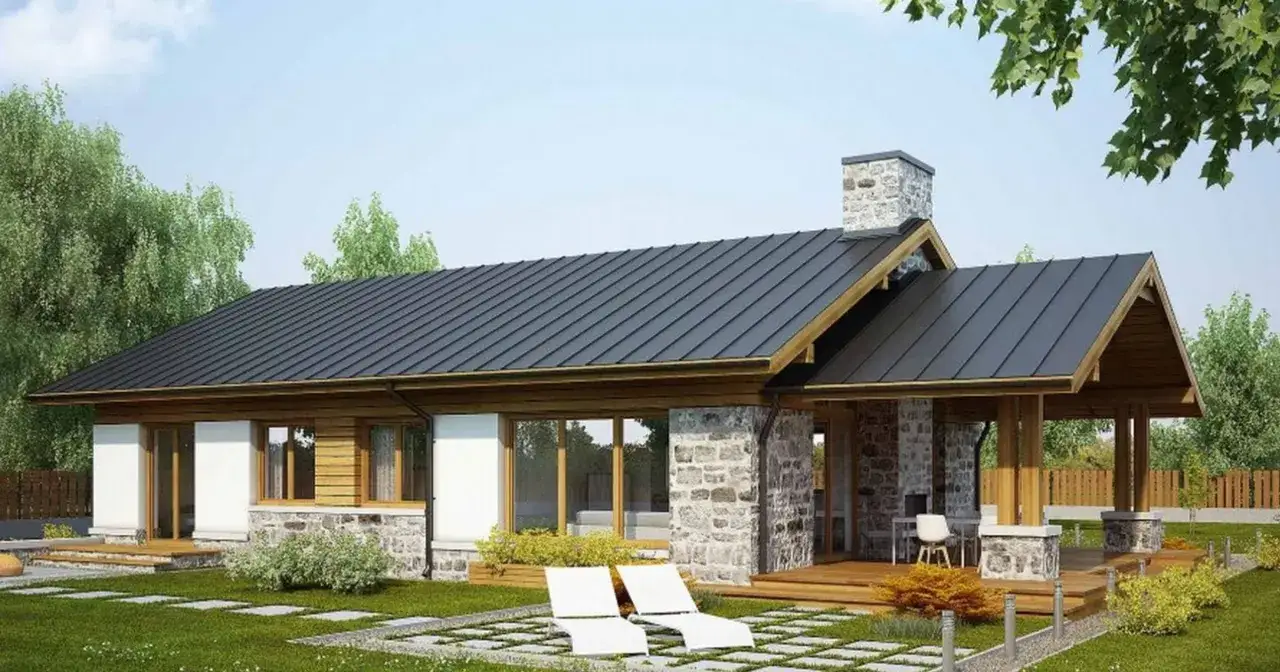 Now wiesz, bungalow co to: nowoczesny dom parterowy z kamienia i drewna, z dużymi oknami i tarasem.